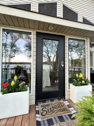 Cozy Front Porch with a Glass Door and Windows