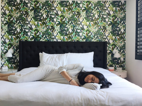Woman Lying Down on her Bed in Sobro Guest House